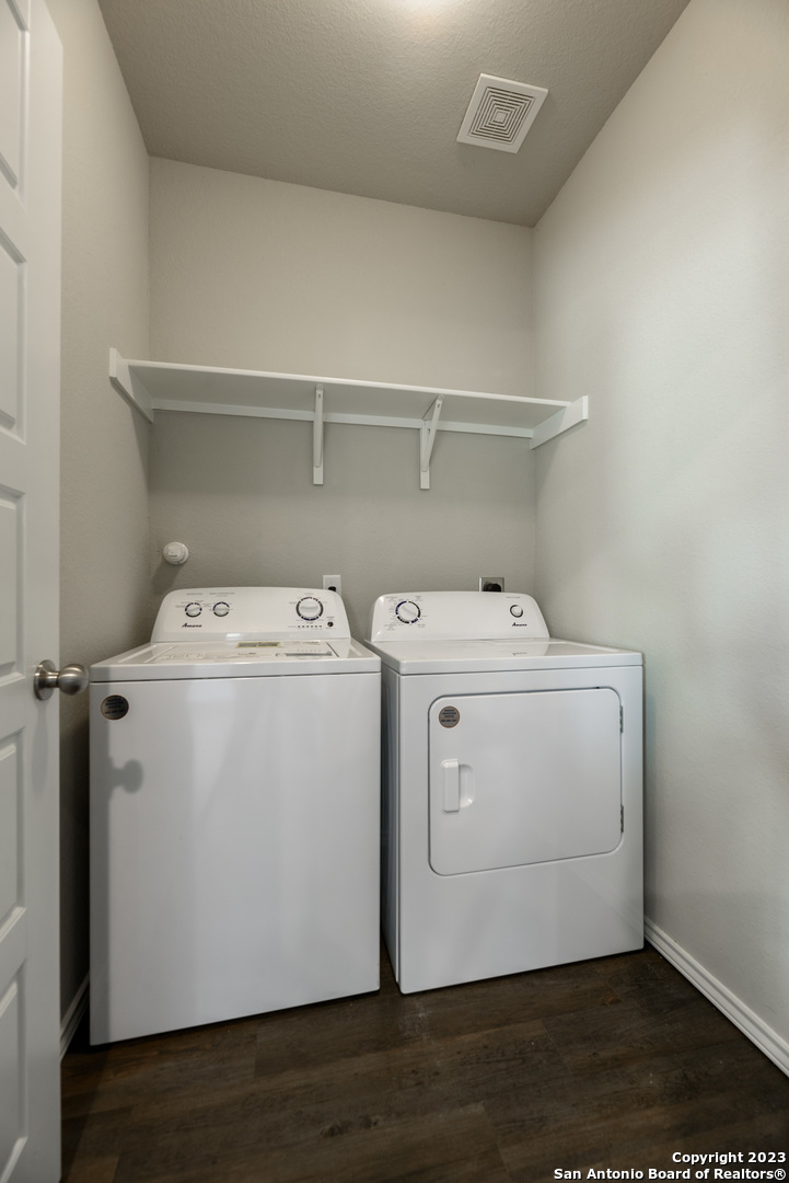 1609 Ranch House New Braunfels, TX 78132 - Photo 13 of 39 a utility room with dryer and washer