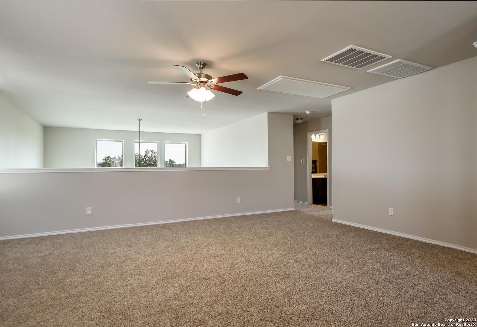 1609 Ranch House New Braunfels, TX 78132 - Photo 20 of 39 a view of an empty room with a kitchen