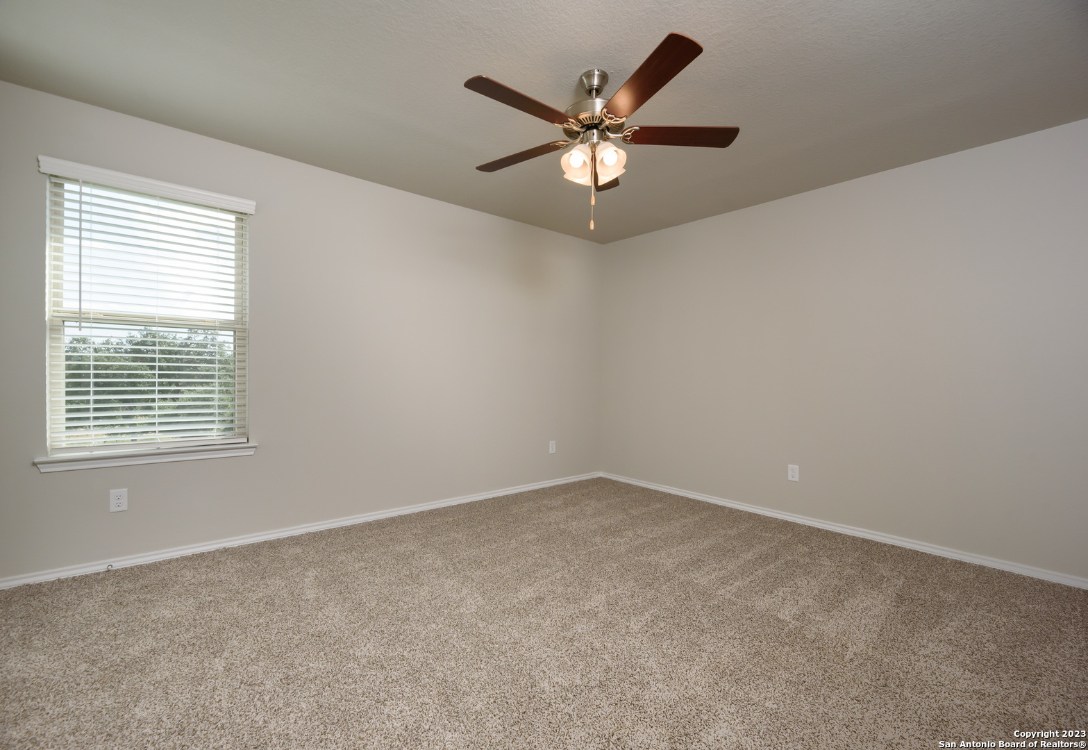 1609 Ranch House New Braunfels, TX 78132 - Photo 21 of 39 an empty room with a window and a fan