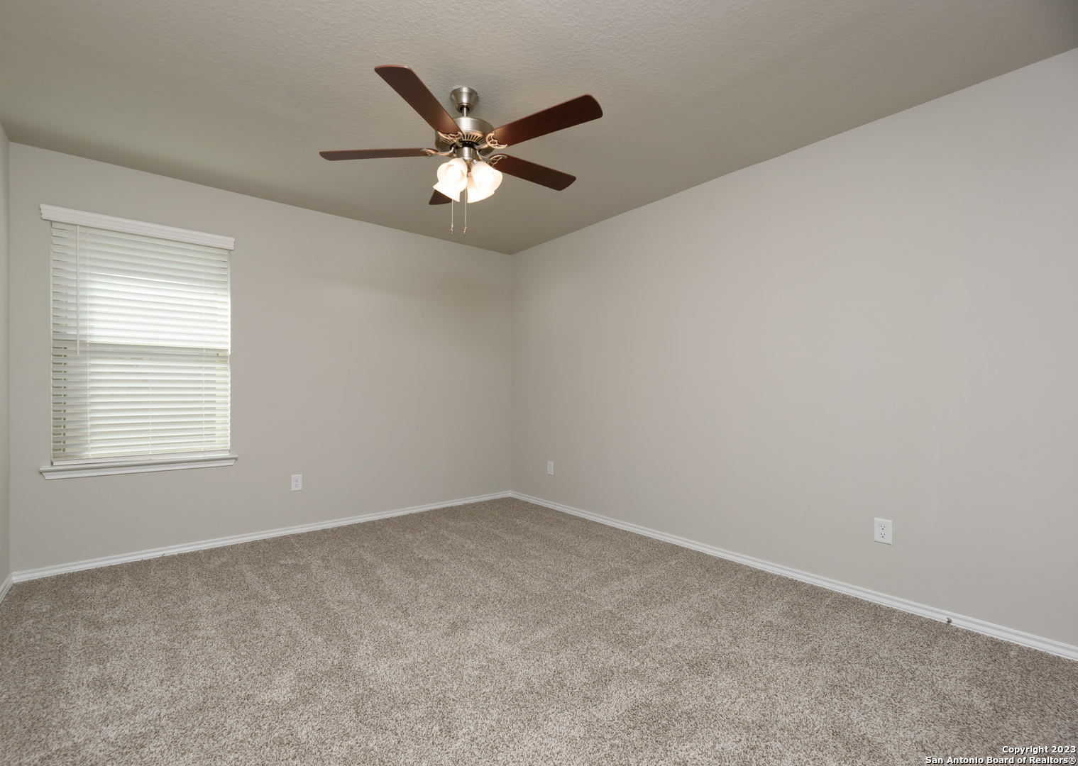 1609 Ranch House New Braunfels, TX 78132 - Photo 22 of 39 an empty room with a window and a fan
