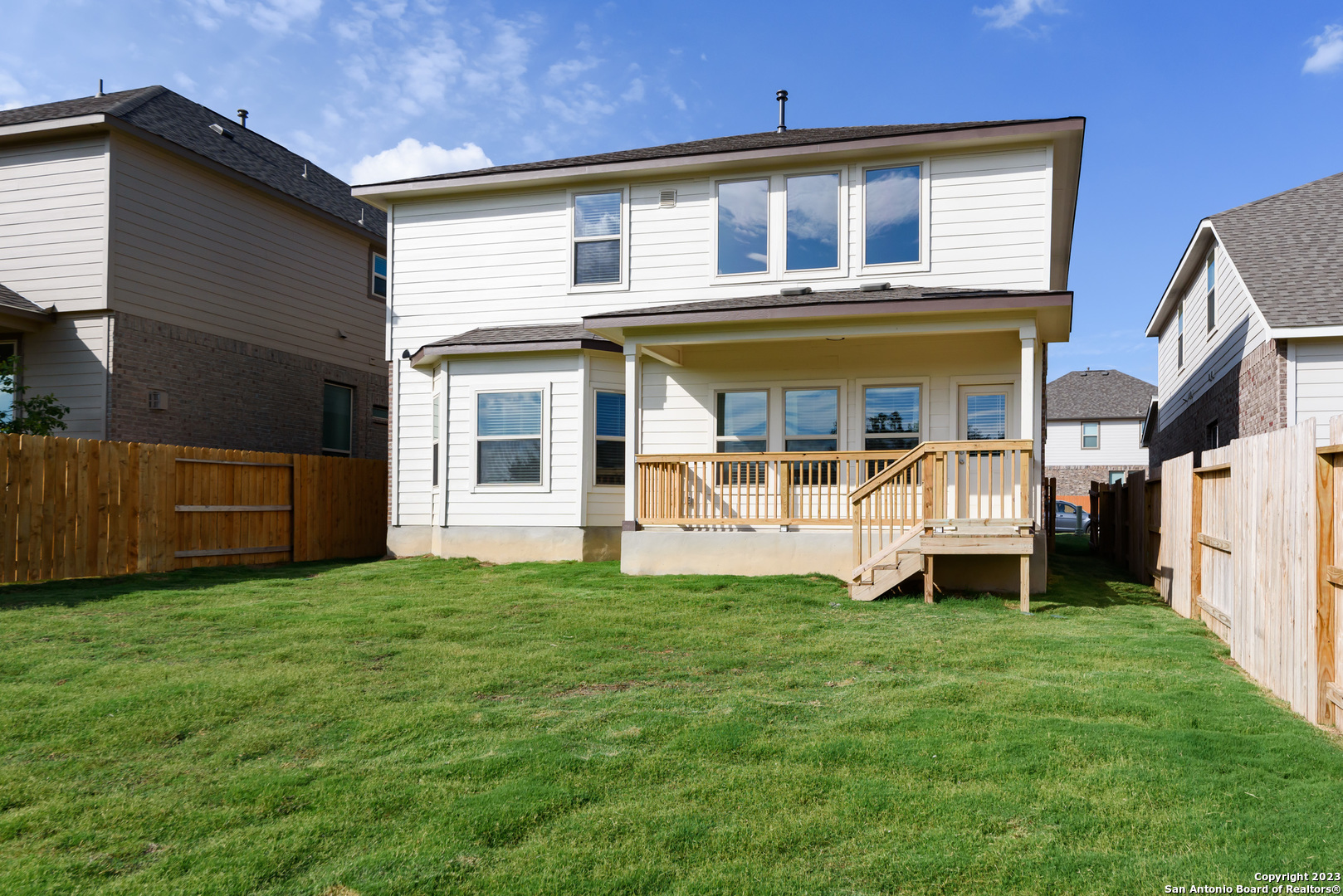 1609 Ranch House New Braunfels, TX 78132 - Photo 23 of 39 a front view of a house with a yard and porch