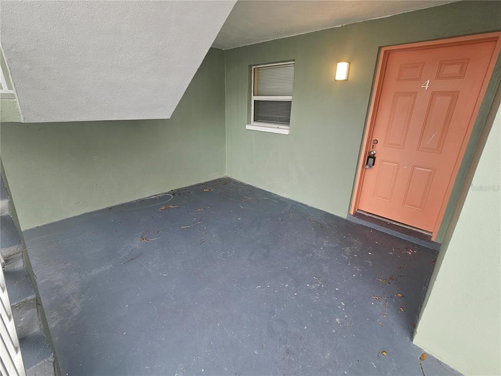 2045 Alpine Road, Unit 3 Clearwater, FL 33755 - Photo 5 of 18 an empty room with a window