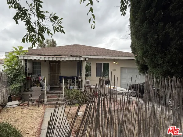 a view of a house with patio