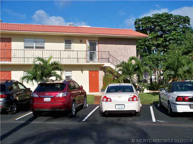 1919 Southwest Palm City Road, Unit 10J Stuart, FL 34994 - Photo 1 of 25 Exterior Front. MYCC upstairs corner condo