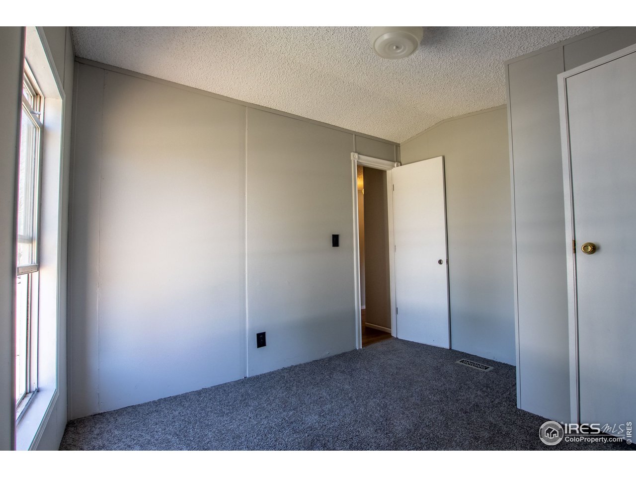 4904 Eagle Crest Boulevard, Unit 221 Firestone, CO 80504 - Photo 22 of 25 a view of an empty room