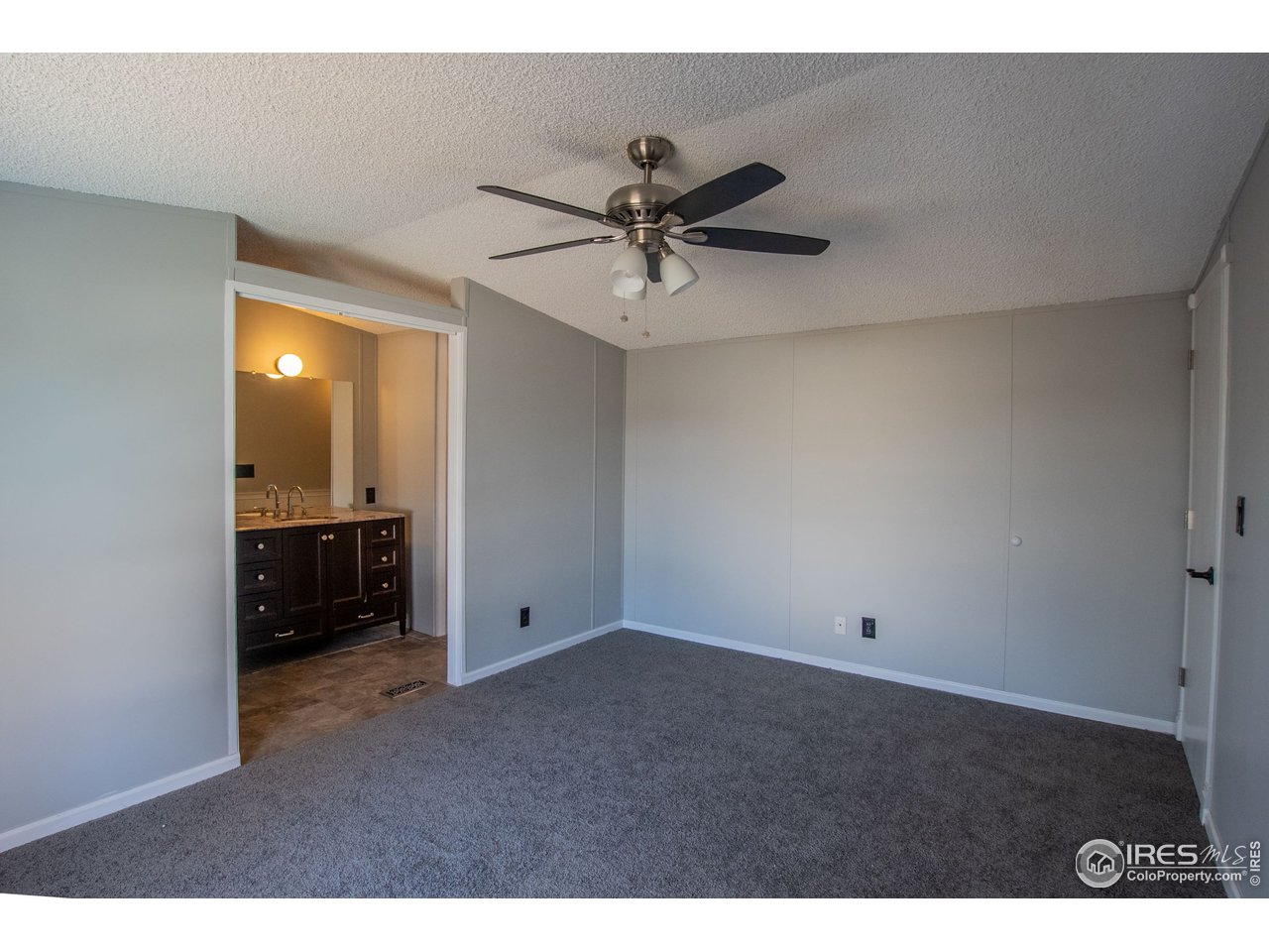 4904 Eagle Crest Boulevard, Unit 221 Firestone, CO 80504 - Photo 8 of 25 a view of an empty room