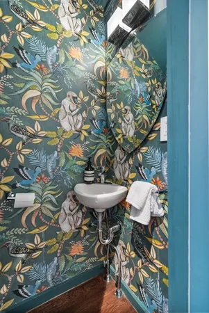 a bathroom with a toilet and a sink