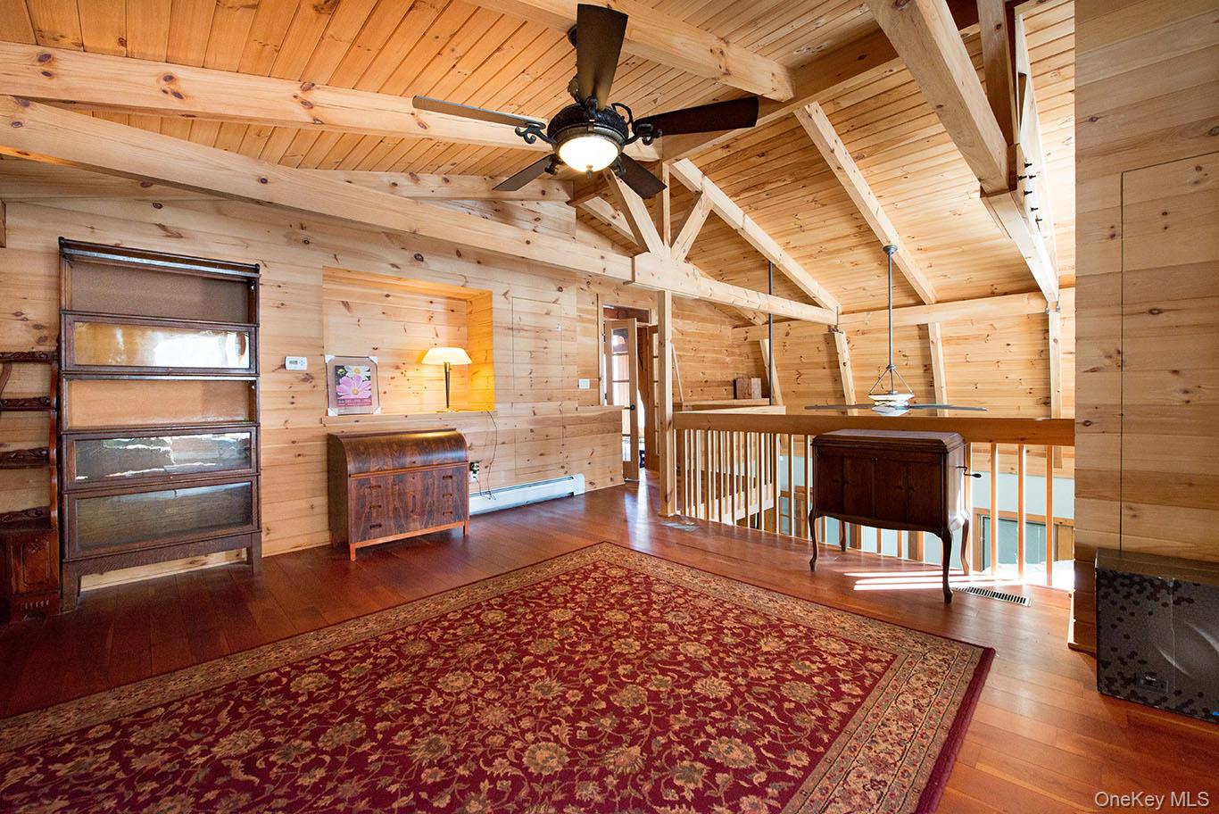 1644 Lakes Road Monroe, NY 10950 - Photo 17 of 49 a living room with a rug