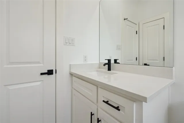 a bathroom with a tub and shower