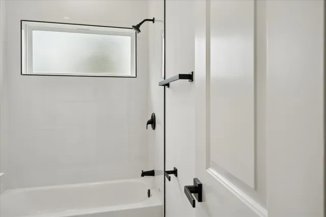 a view of a small space with wooden floor