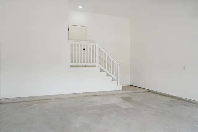 a view of balcony with wooden floor