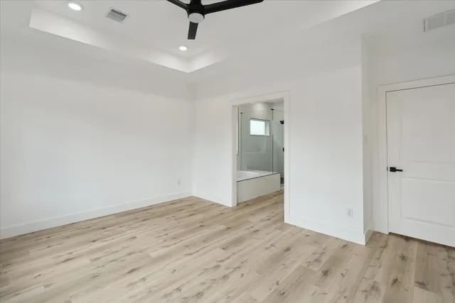 a bathroom with a double vanity sink mirror and shower