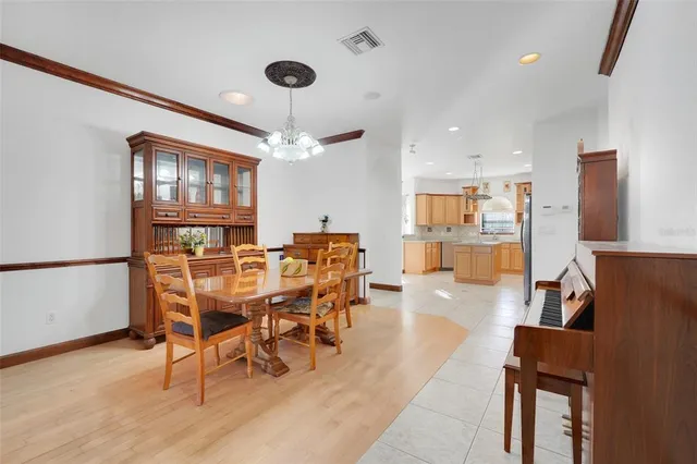a spacious bathroom with a large tub sink and mirror