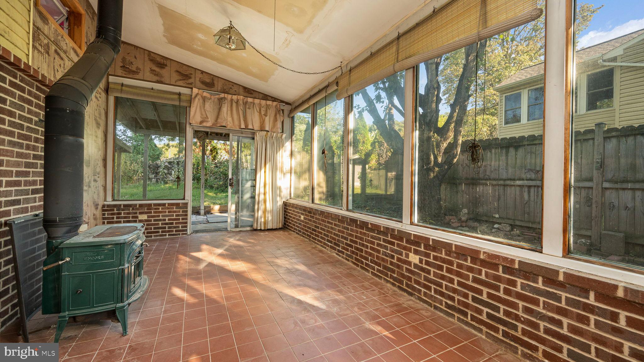 751 Ferndale Road Mount Joy, PA 17552 - Photo 17 of 32 Sunlit sunroom with expansive views.