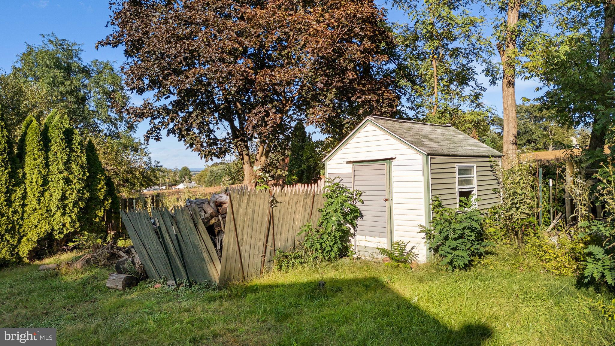 751 Ferndale Road Mount Joy, PA 17552 - Photo 30 of 32 Charming backyard with a rustic shed.