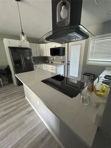 a view of bedroom and hallway