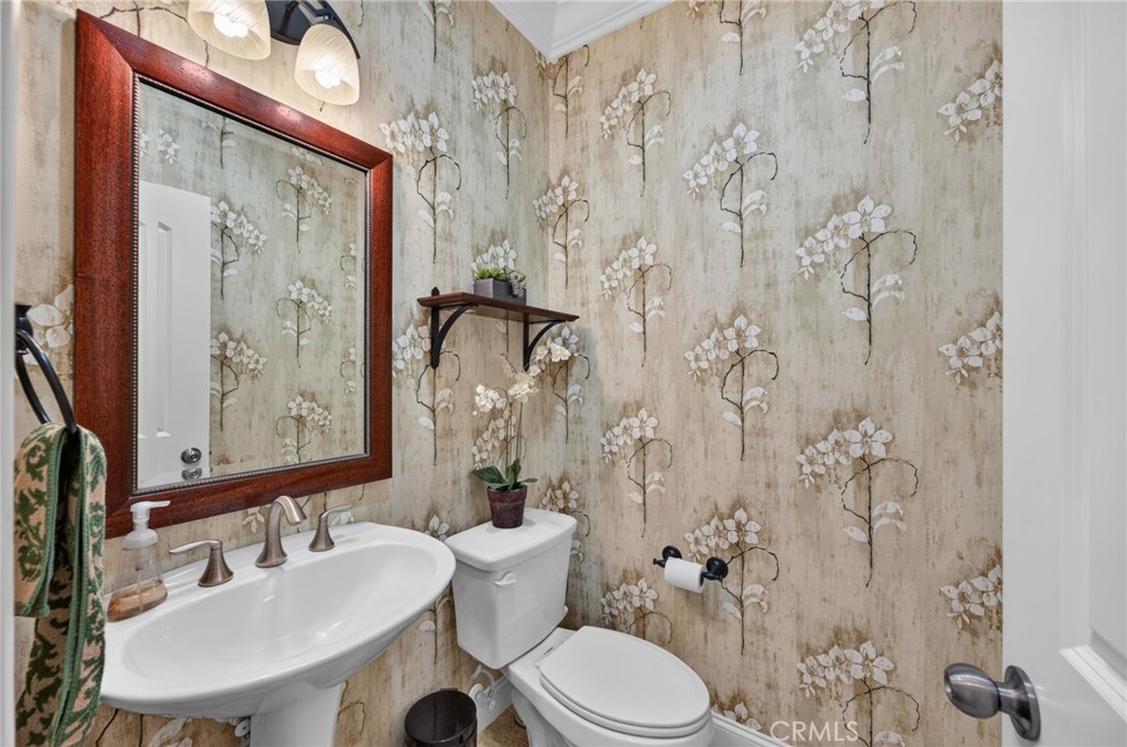31749 Country View Road Temecula, CA 92591 - Photo 18 of 68 a bathroom with a toilet sink and shower