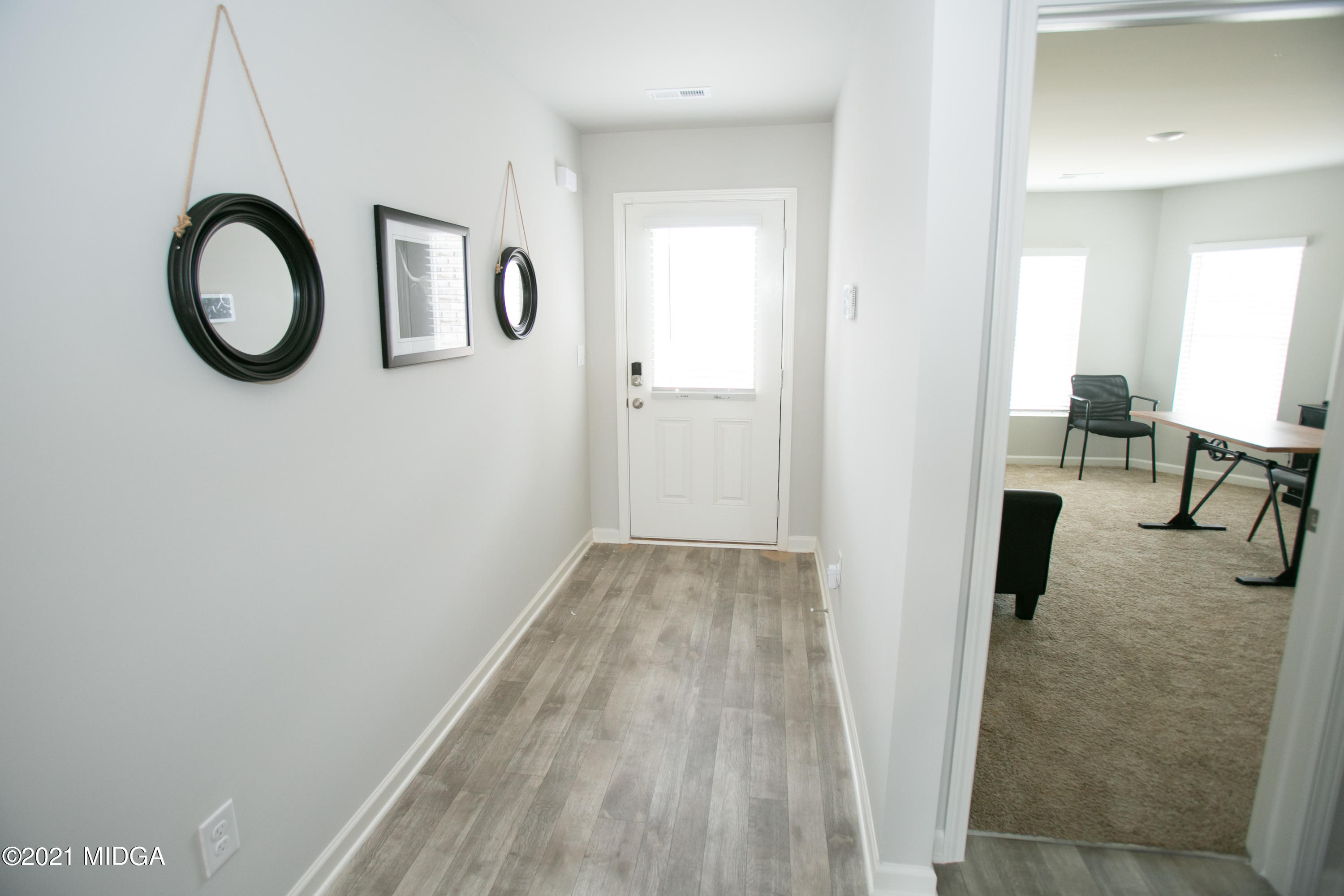 103 Sara Kay Lane, Unit 37 Macon, GA 31210 - Photo 2 of 38 a view of a livingroom with wooden floor