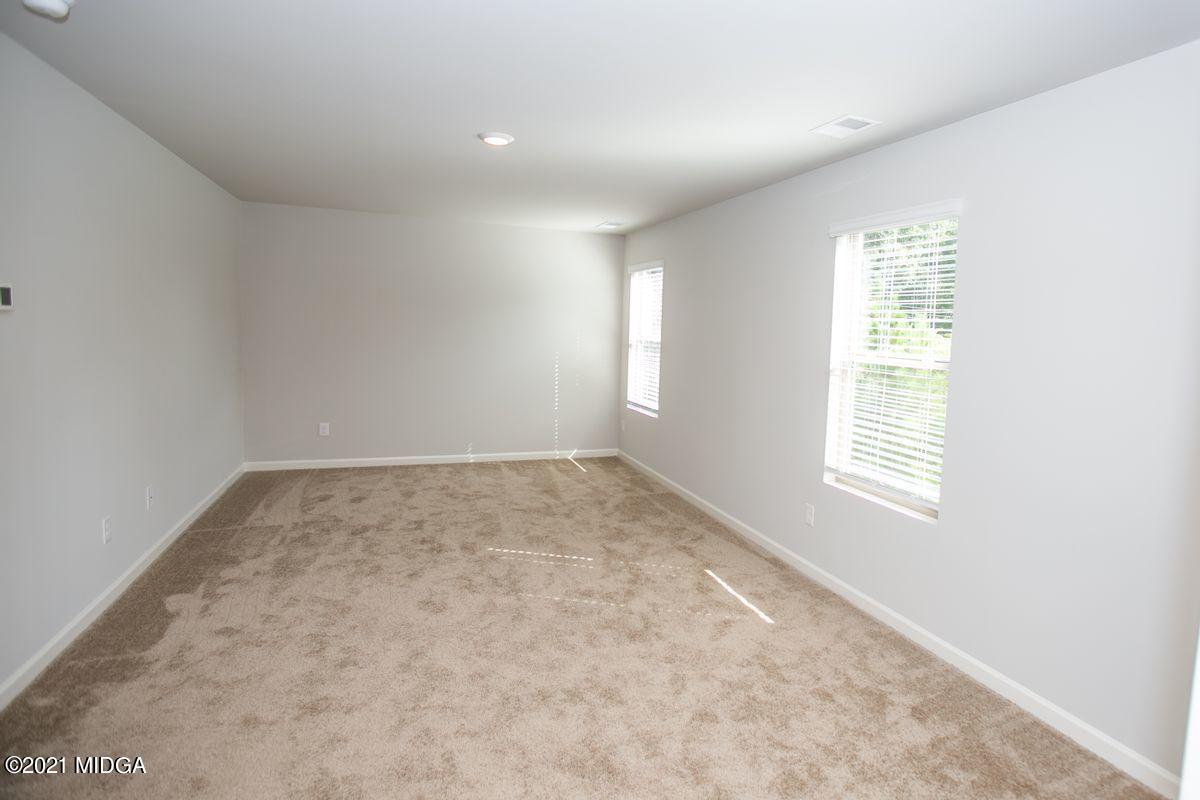103 Sara Kay Lane, Unit 37 Macon, GA 31210 - Photo 26 of 38 an empty room with a window