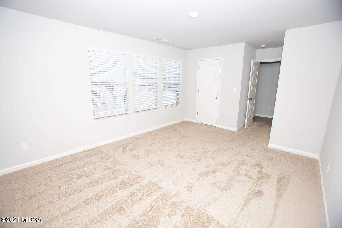 103 Sara Kay Lane, Unit 37 Macon, GA 31210 - Photo 28 of 38 a view of an empty room with a window