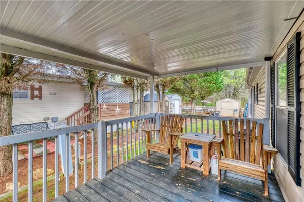 a view of a porch with furniture