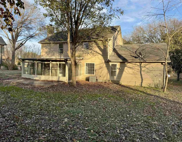 a house view with a garden space