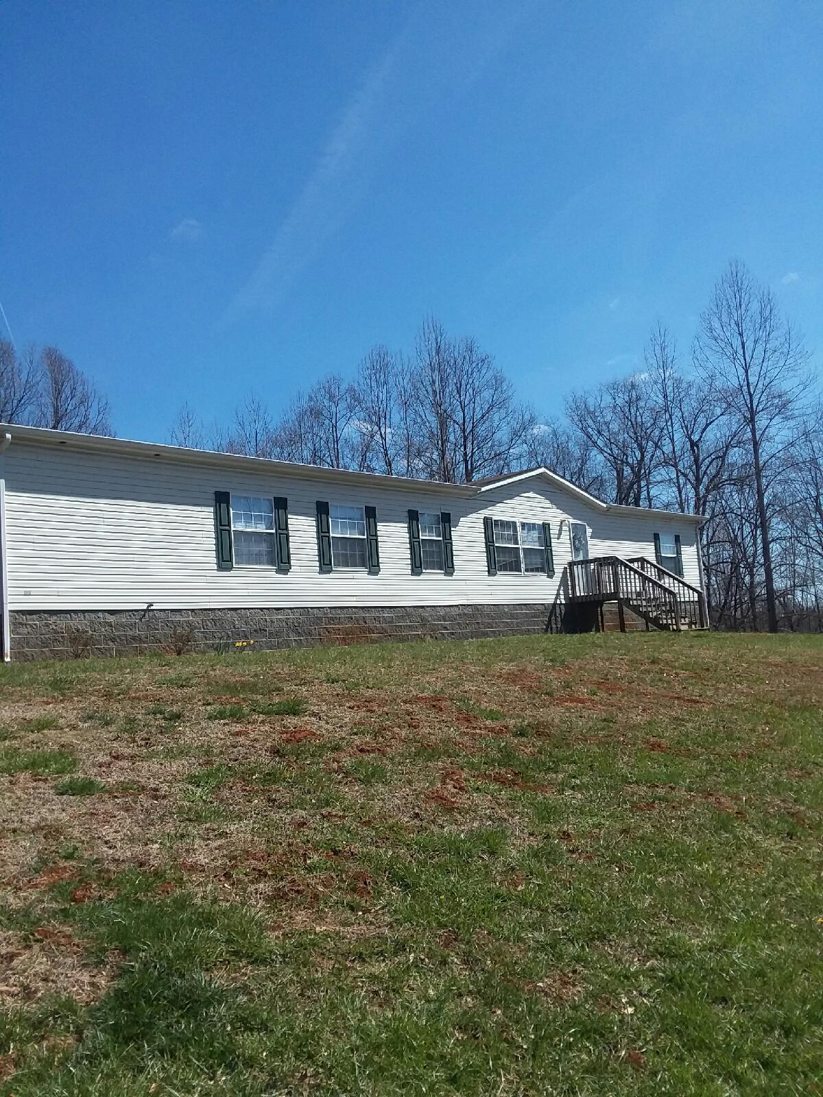 1245 Northridge Road Hardy, VA 24101 - Photo 14 of 14 a front view of a house with a garden