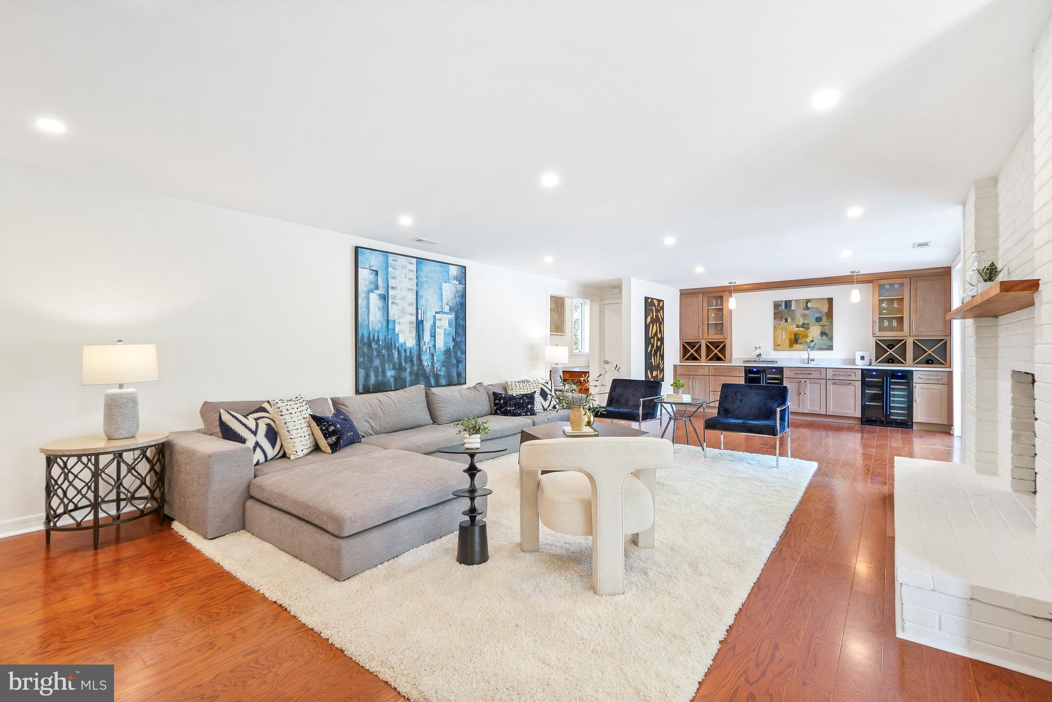 7301 Marbury Road Bethesda, MD 20817 - Photo 22 of 81 a living room with furniture and a wooden floor