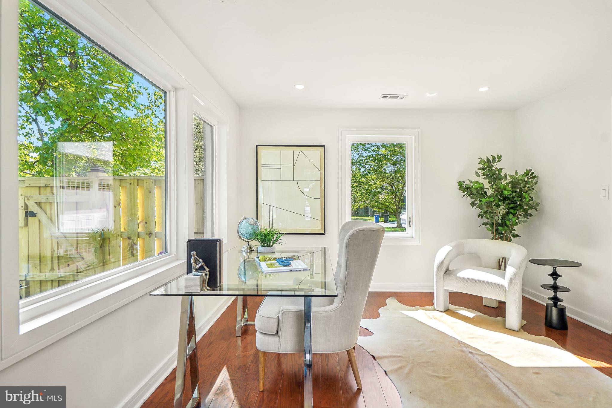 7301 Marbury Road Bethesda, MD 20817 - Photo 25 of 81 a living room with furniture and a large window