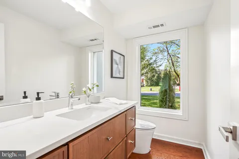 a bathroom with a bathtub and a sink
