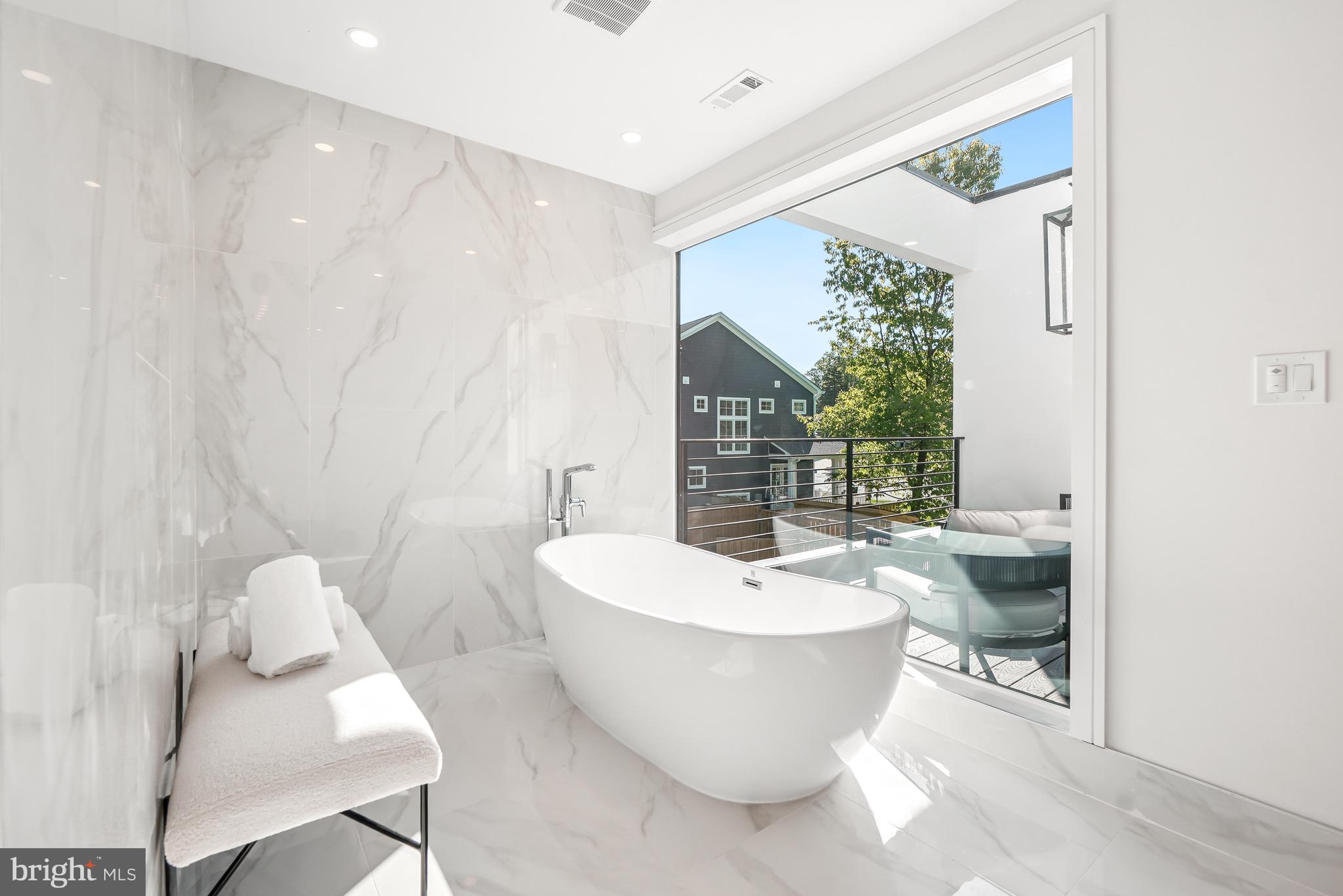 7301 Marbury Road Bethesda, MD 20817 - Photo 40 of 81 a white bath tub sitting next to a white toilet