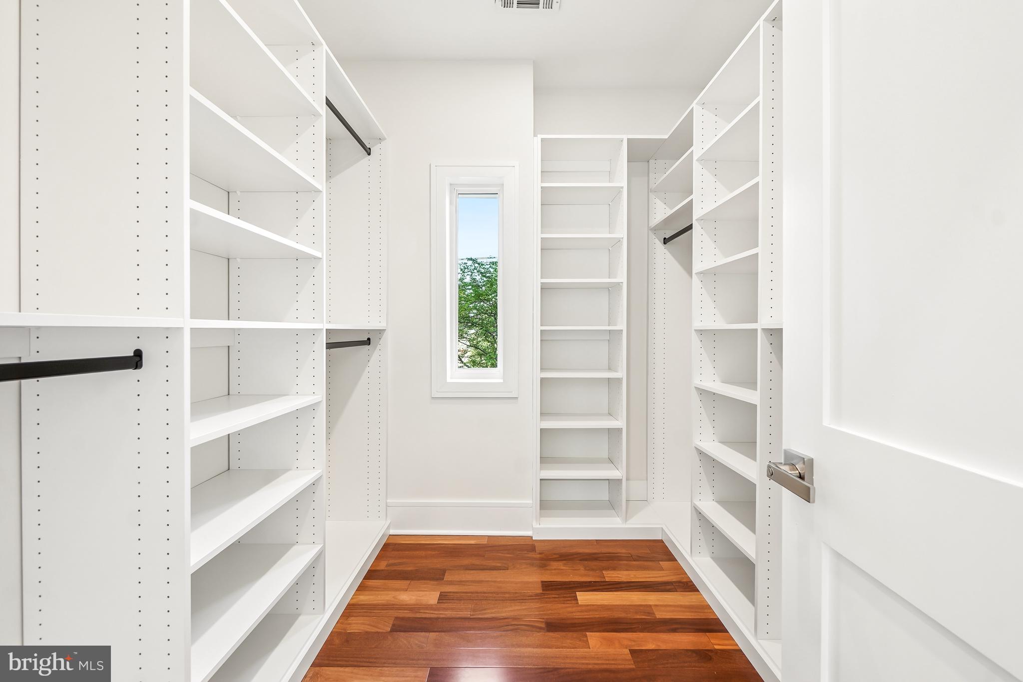 7301 Marbury Road Bethesda, MD 20817 - Photo 49 of 81 a view of a room with shelves on the wall