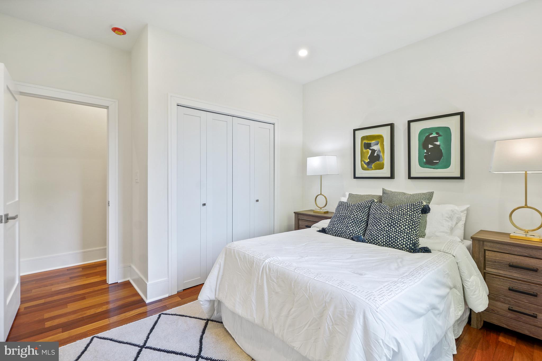 7301 Marbury Road Bethesda, MD 20817 - Photo 51 of 81 a bedroom with a bed and painting on the wall