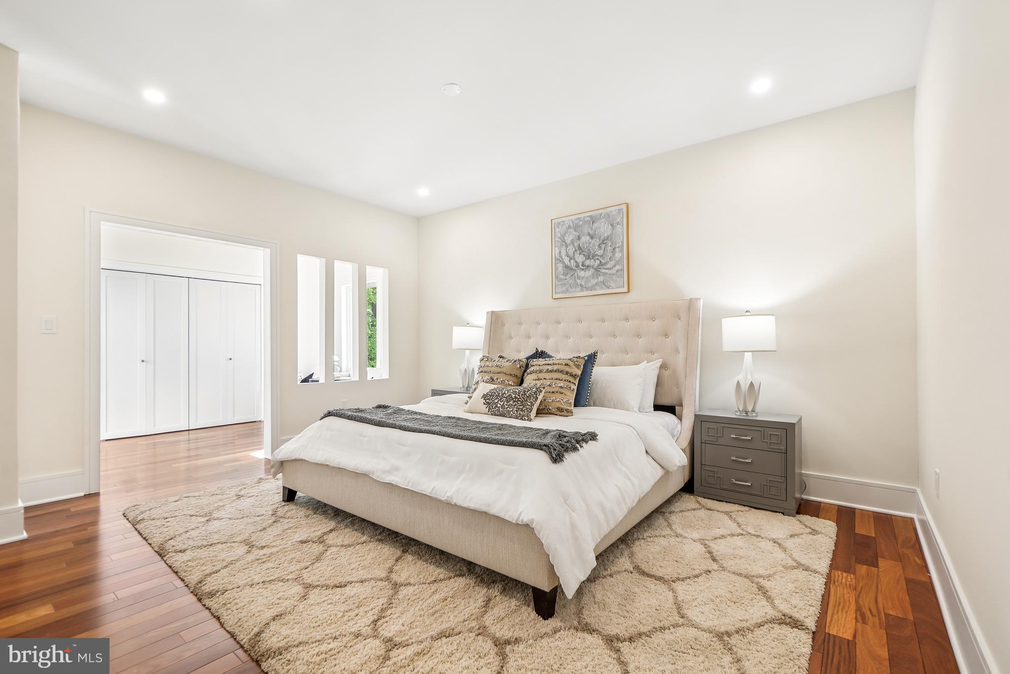 7301 Marbury Road Bethesda, MD 20817 - Photo 52 of 81 a bedroom with a bed and a night stand