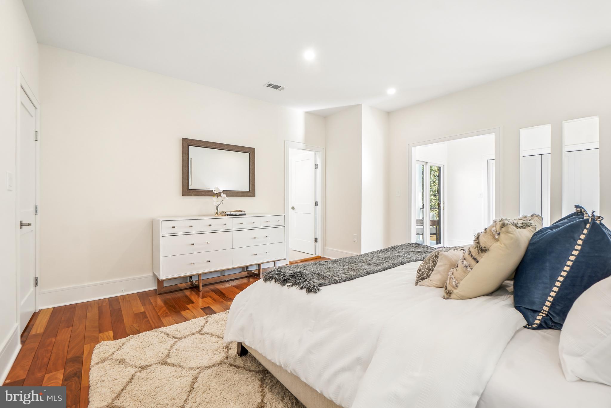 7301 Marbury Road Bethesda, MD 20817 - Photo 54 of 81 a bedroom with a bed and a furniture