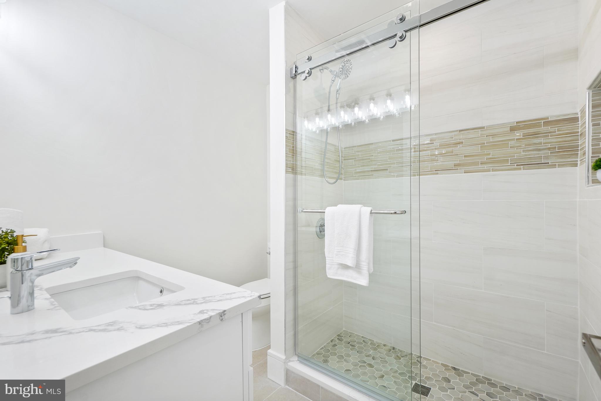 7301 Marbury Road Bethesda, MD 20817 - Photo 58 of 81 a bathroom with a sink and shower