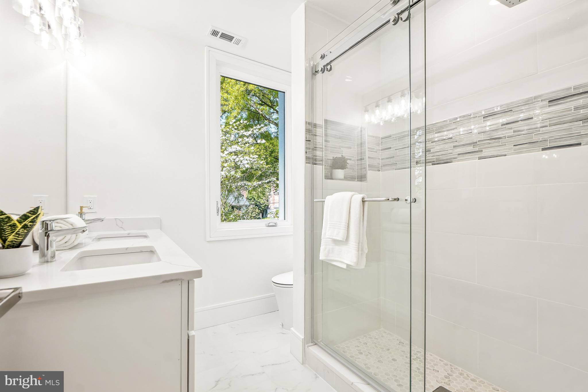 7301 Marbury Road Bethesda, MD 20817 - Photo 62 of 81 a bathroom with a sink and a mirror