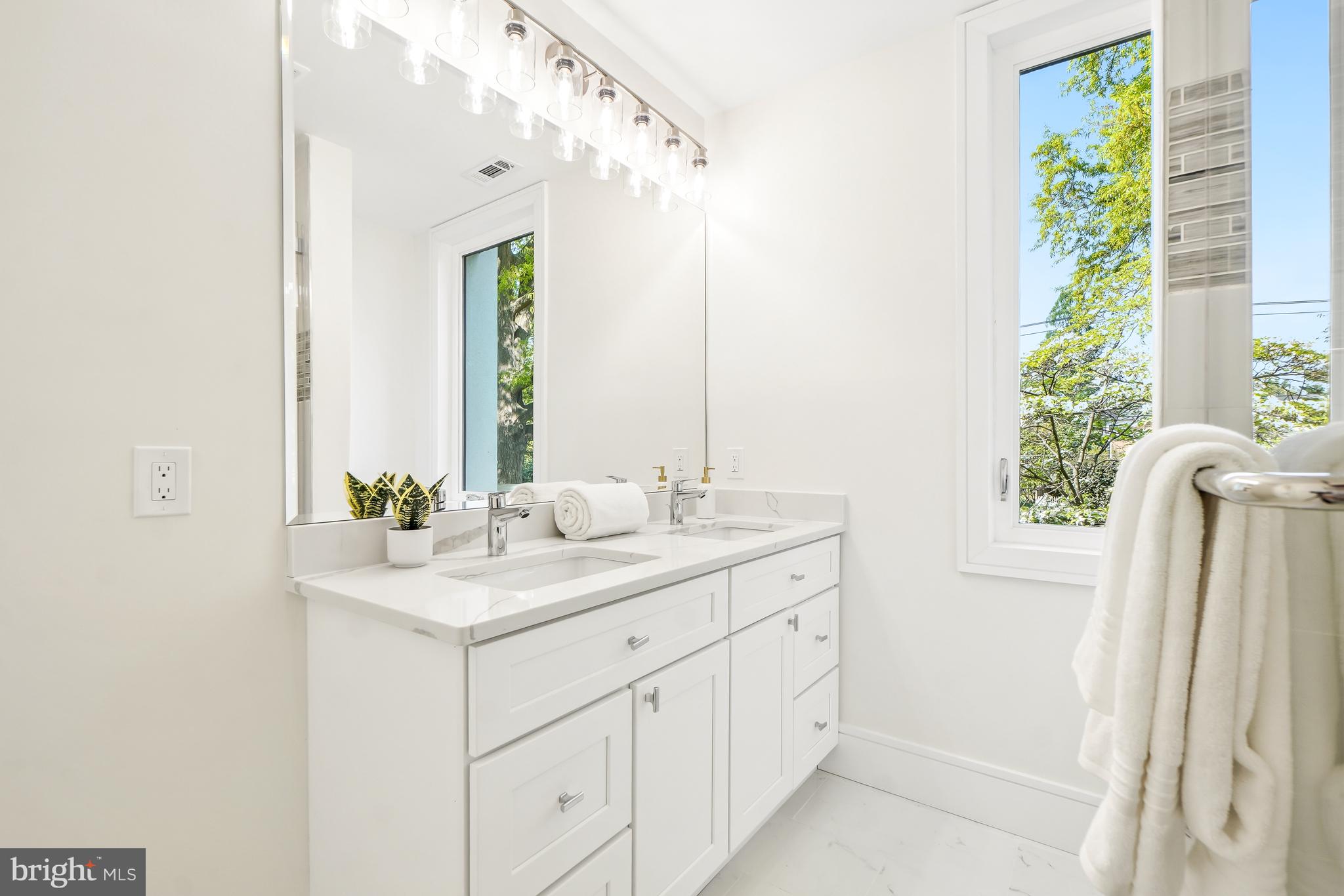 7301 Marbury Road Bethesda, MD 20817 - Photo 63 of 81 a bathroom with a sink and a mirror
