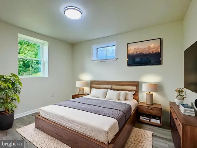 a view of a room with porch and wooden floor