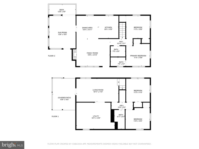 a living room with fireplace furniture and a flat screen tv