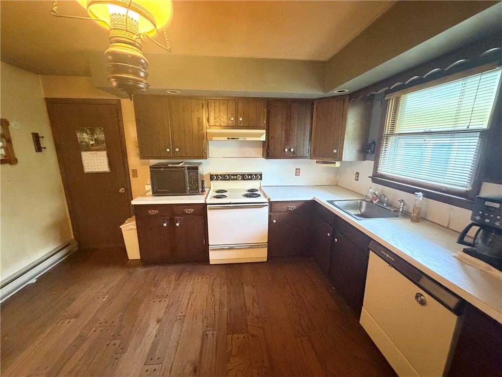 5963 Valley Road Slatington, PA 18080 - Photo 5 of 20 Well-lit kitchen with rich wood cabinetry and ample counter space.