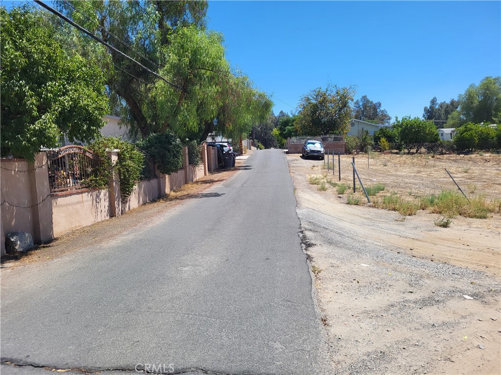 0 Clara Place Menifee, CA 92587 - Photo 2 of 2 a view of a street with palm trees