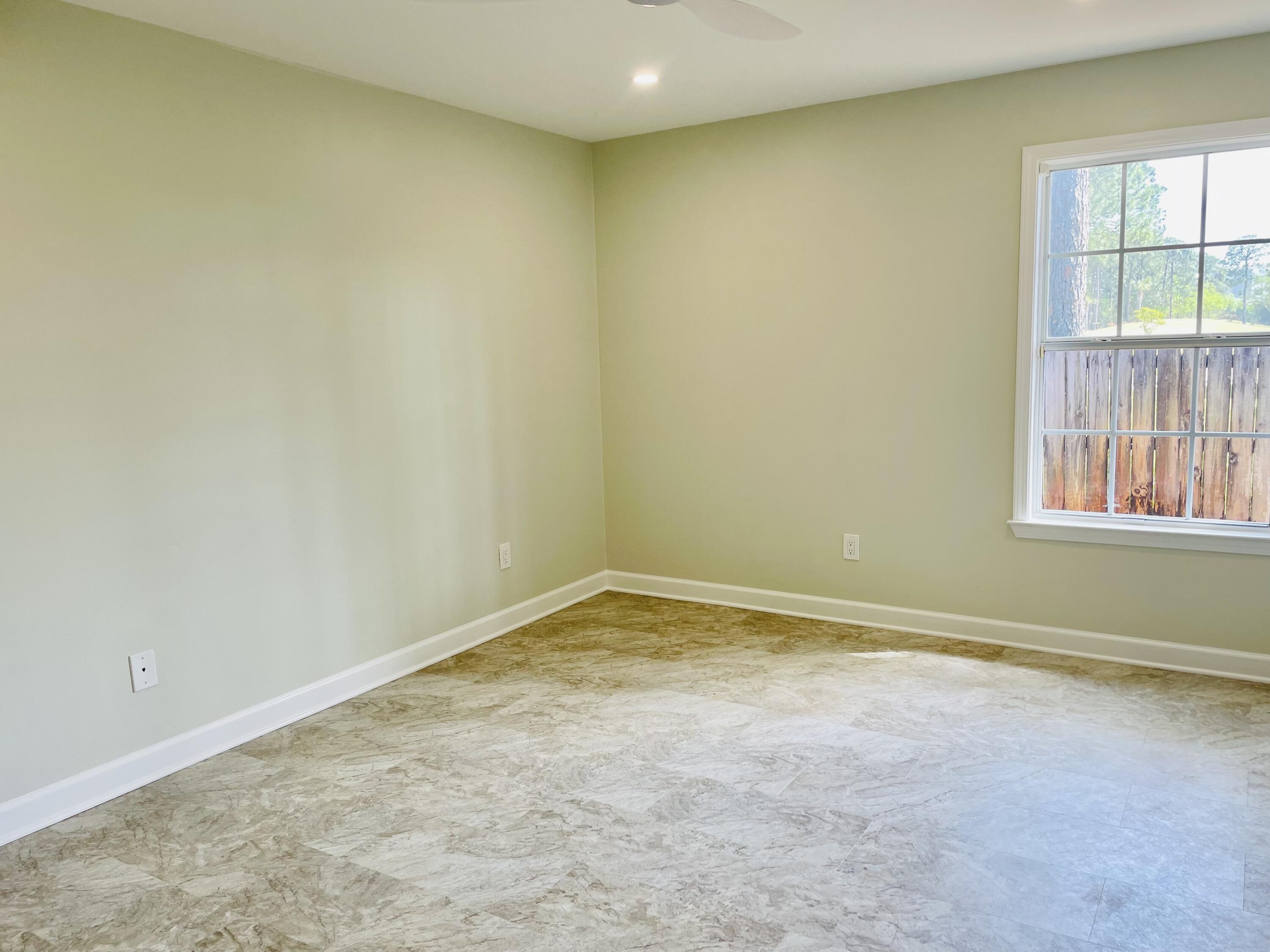 3 Walton Way Miramar Beach, FL 32550 - Photo 17 of 35 an empty room with a windows