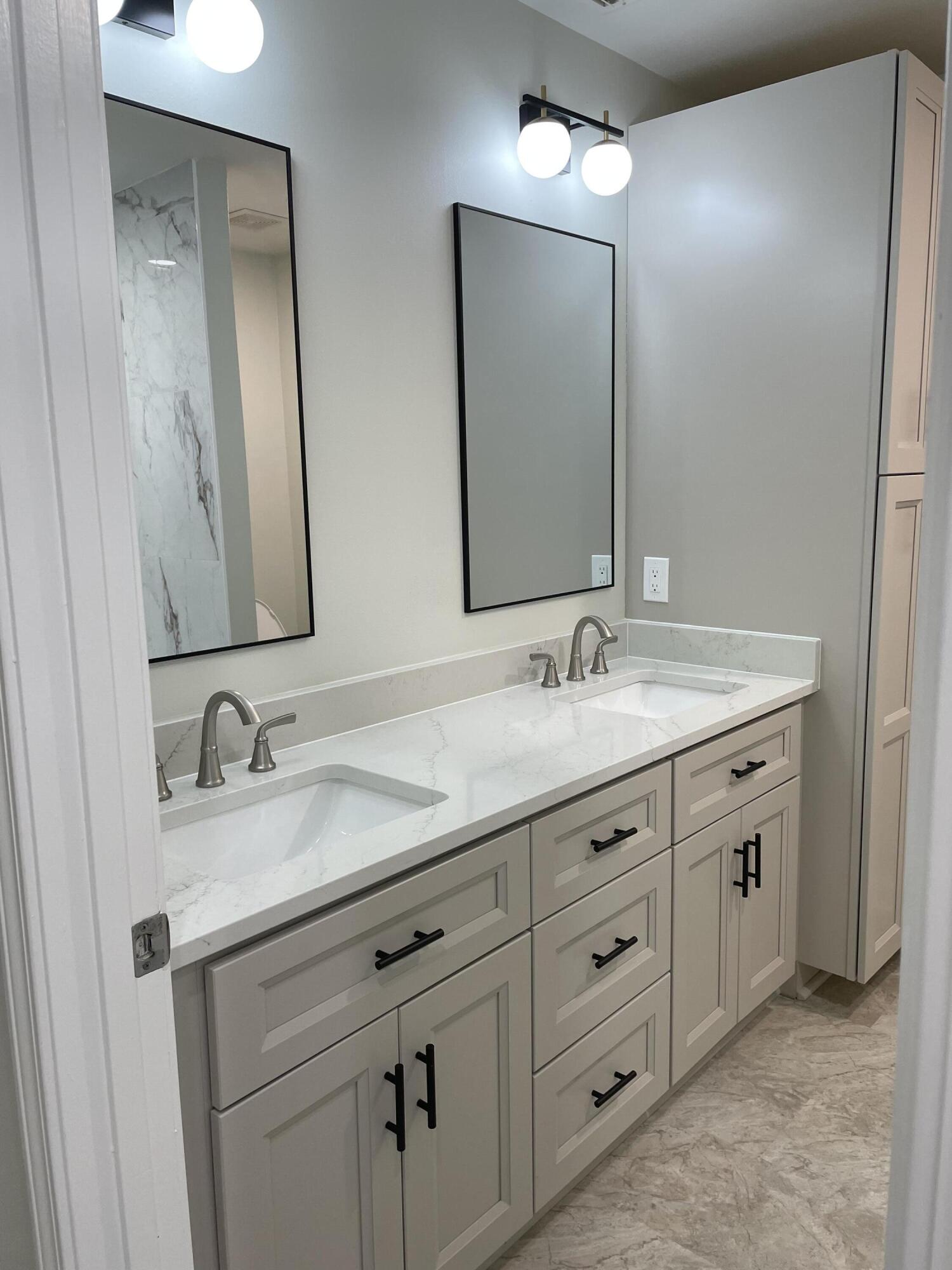 3 Walton Way Miramar Beach, FL 32550 - Photo 18 of 35 a bathroom with double sink and a mirror