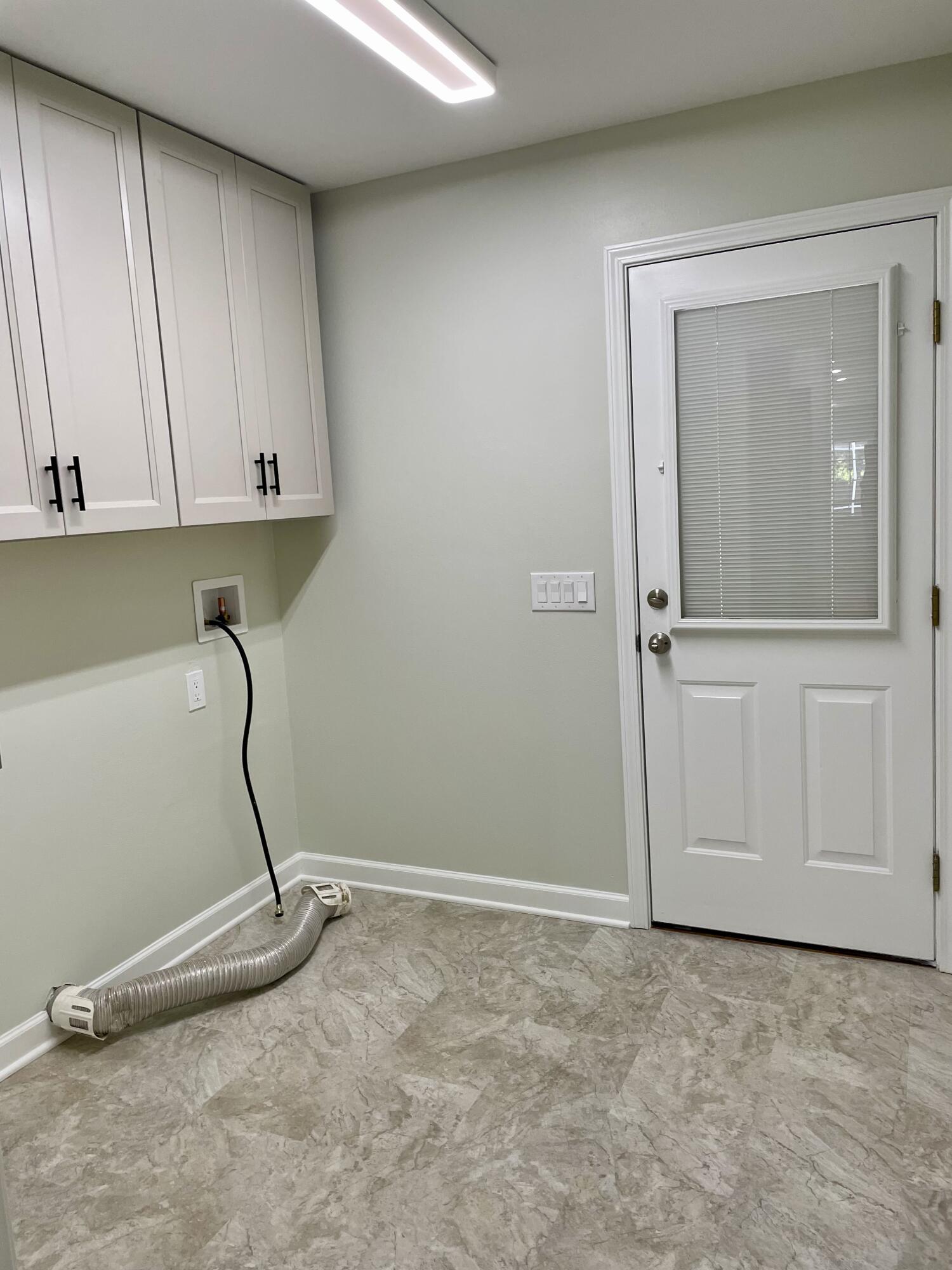 3 Walton Way Miramar Beach, FL 32550 - Photo 20 of 35 a room with a washer and dryer