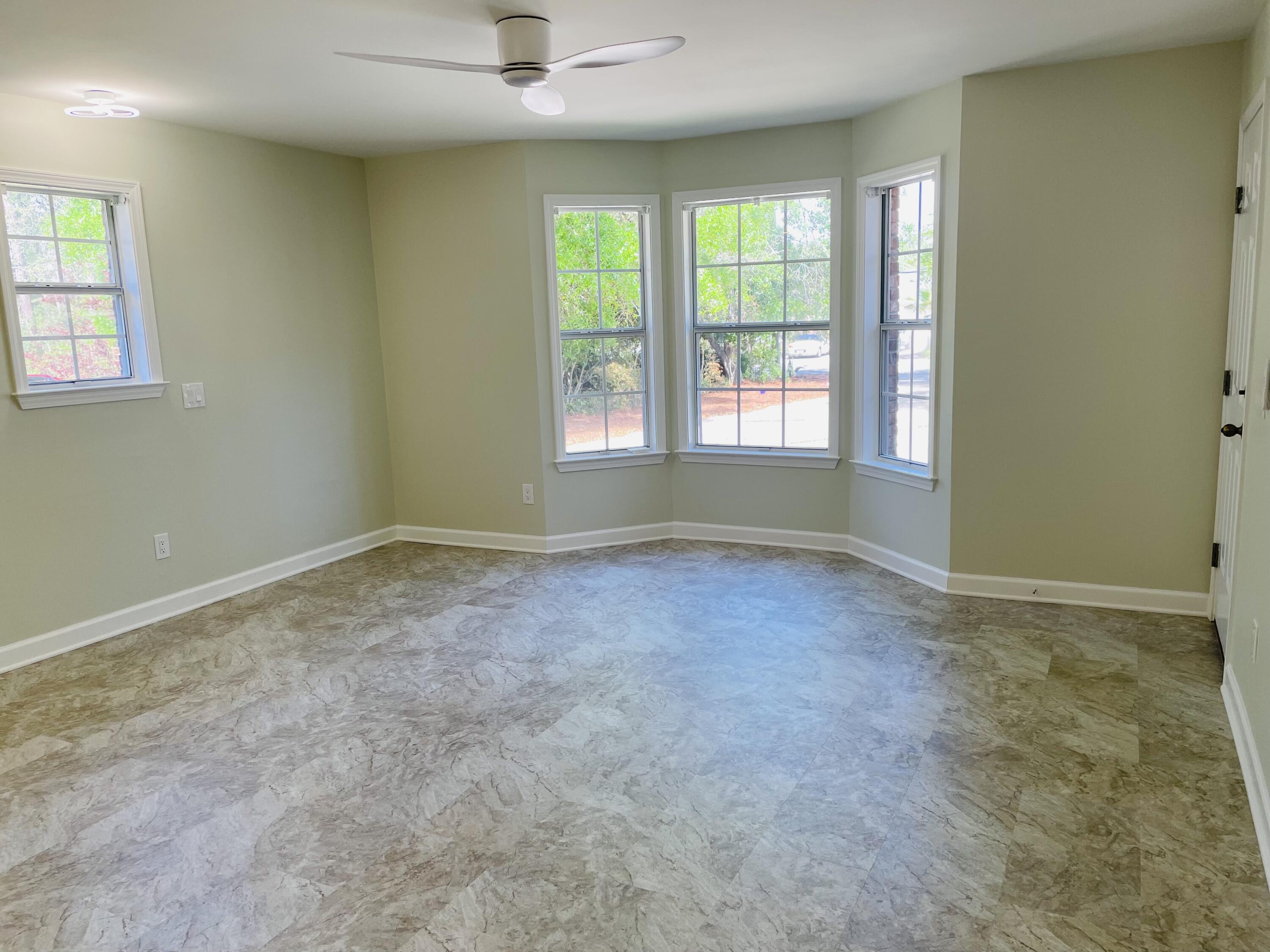 3 Walton Way Miramar Beach, FL 32550 - Photo 21 of 35 an empty room with a empty space and windows