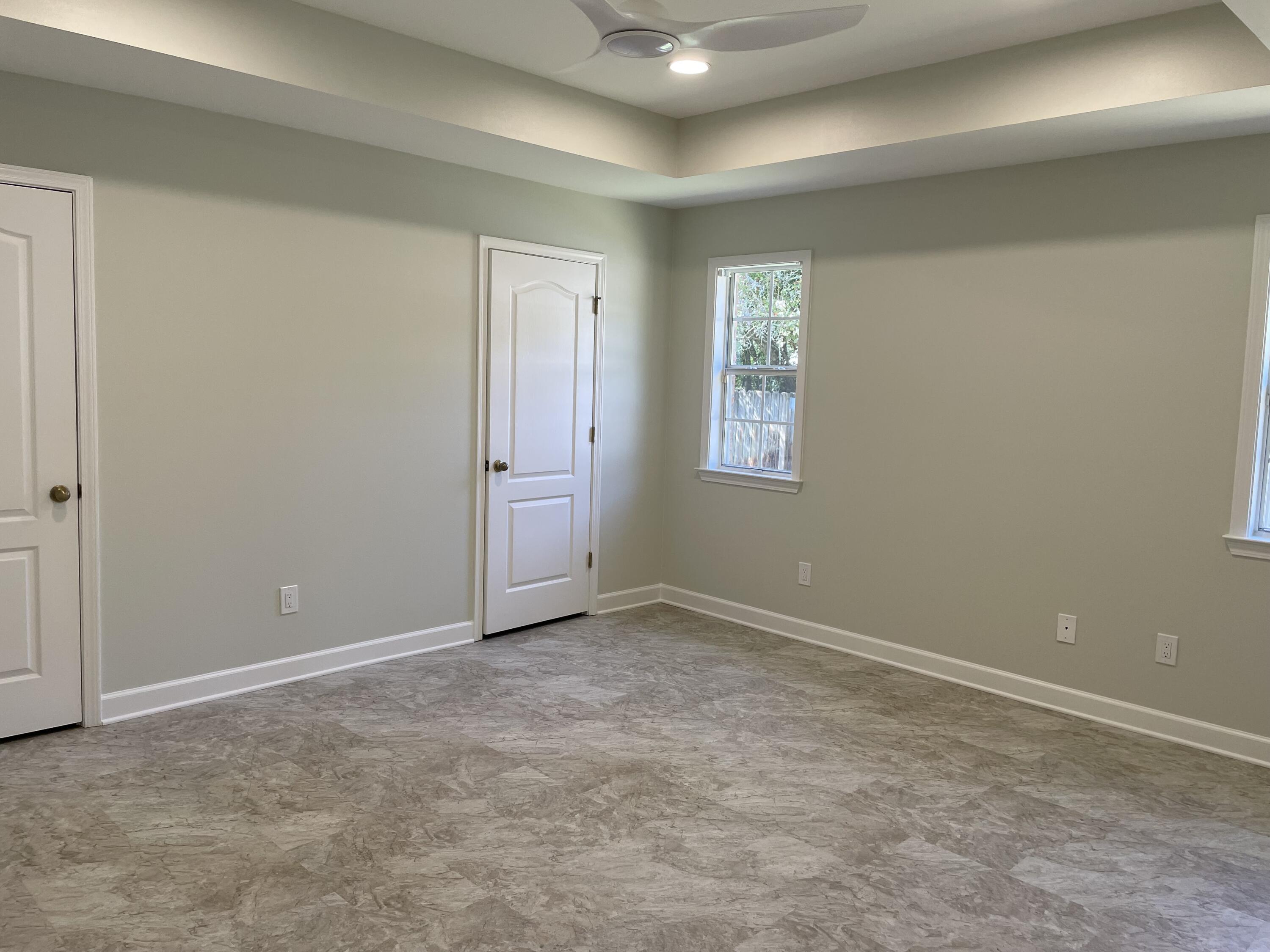 3 Walton Way Miramar Beach, FL 32550 - Photo 24 of 35 an empty room with windows