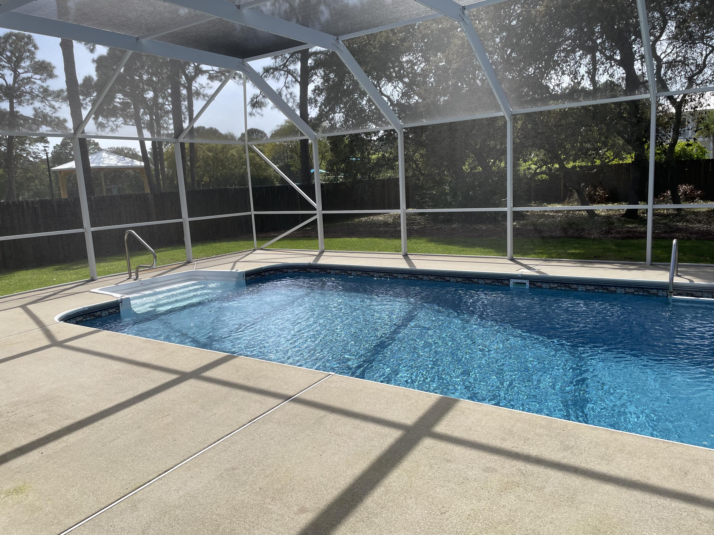 3 Walton Way Miramar Beach, FL 32550 - Photo 30 of 35 a view of a backyard