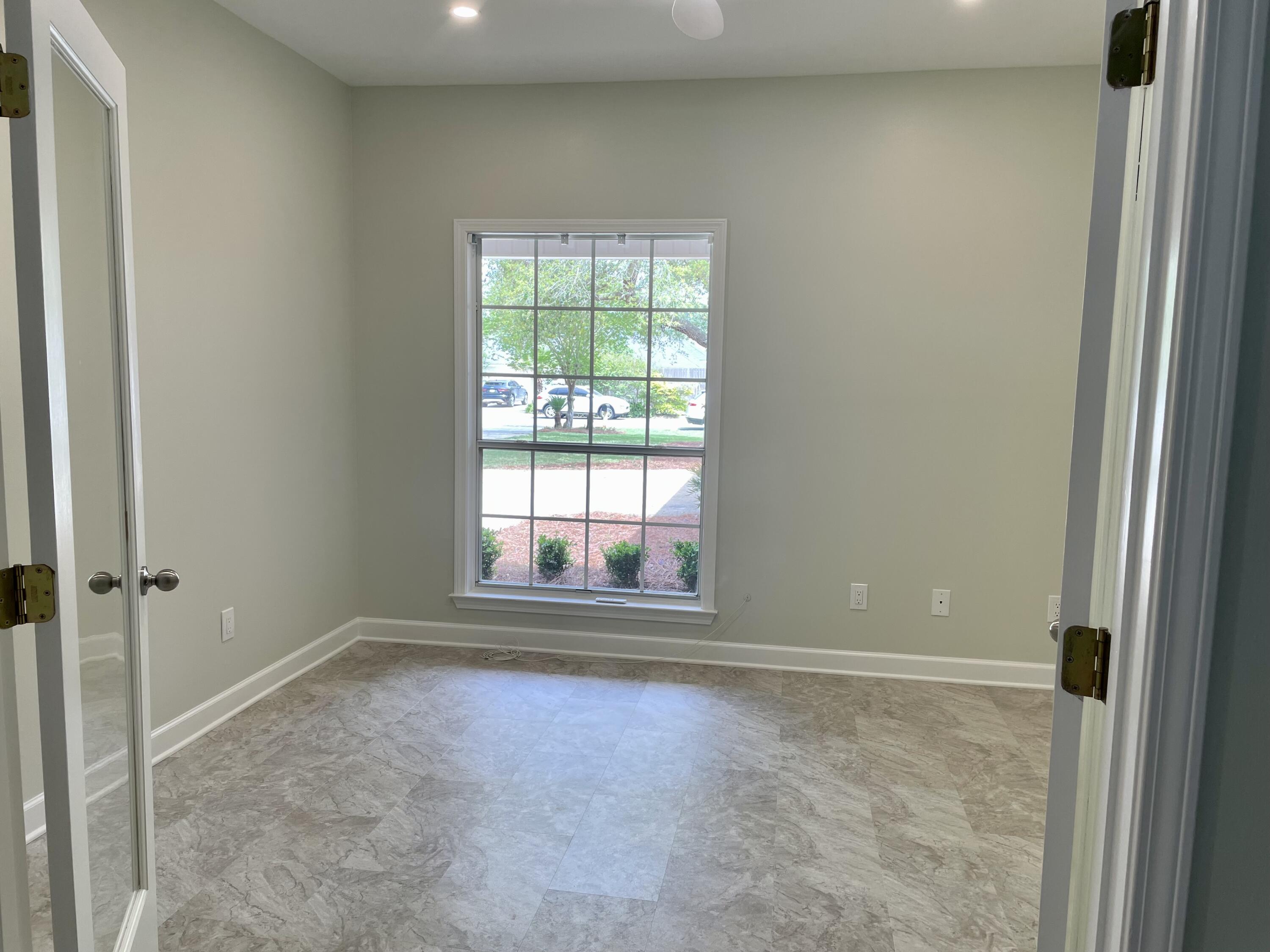 3 Walton Way Miramar Beach, FL 32550 - Photo 7 of 35 an empty room with windows