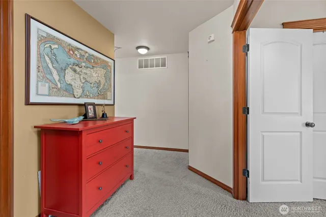 a room with furniture and a cabinet